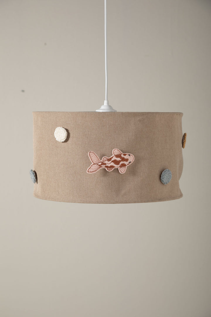 Interchangeable embroidered patches for Saga nursery lampshade