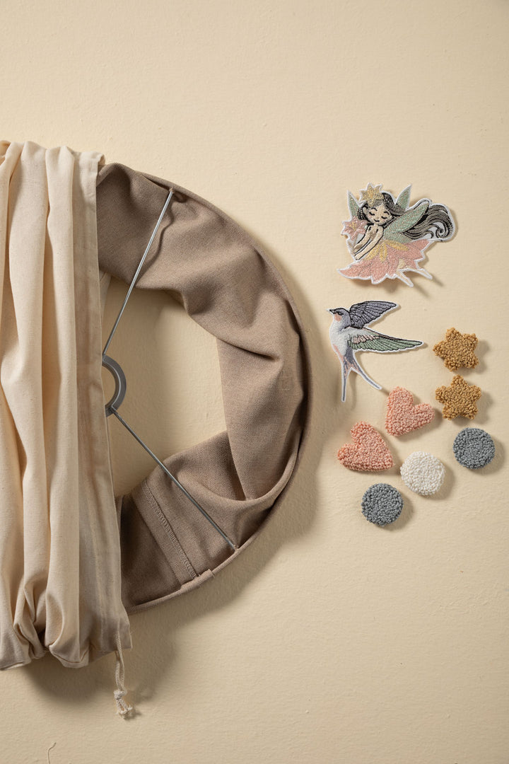Nursery lampshade with hook and loop interchangeable patches